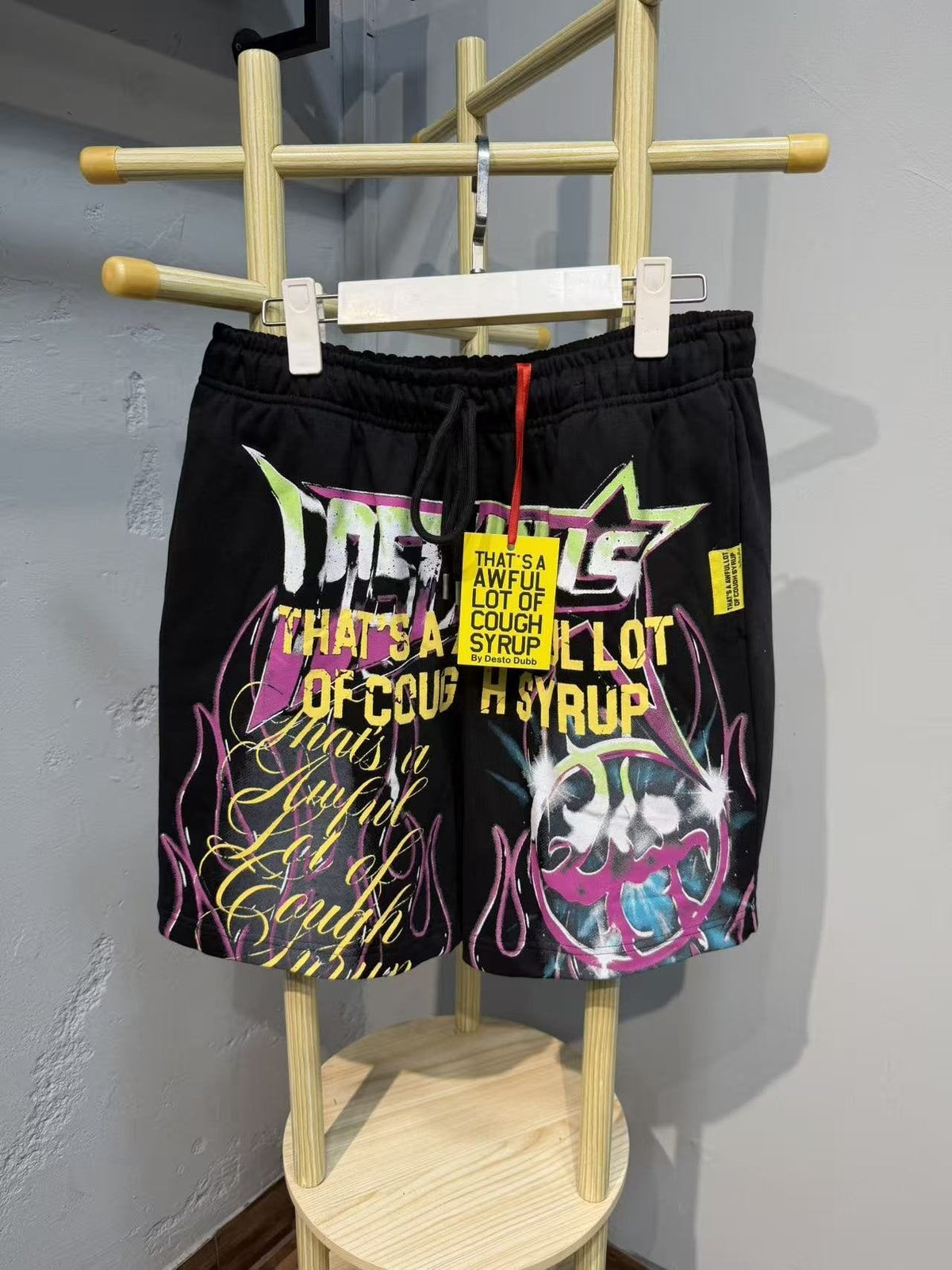 THAT'S A AWFUL LOT OF COUGH SYRUP Black Graphic Drawstring Shorts
