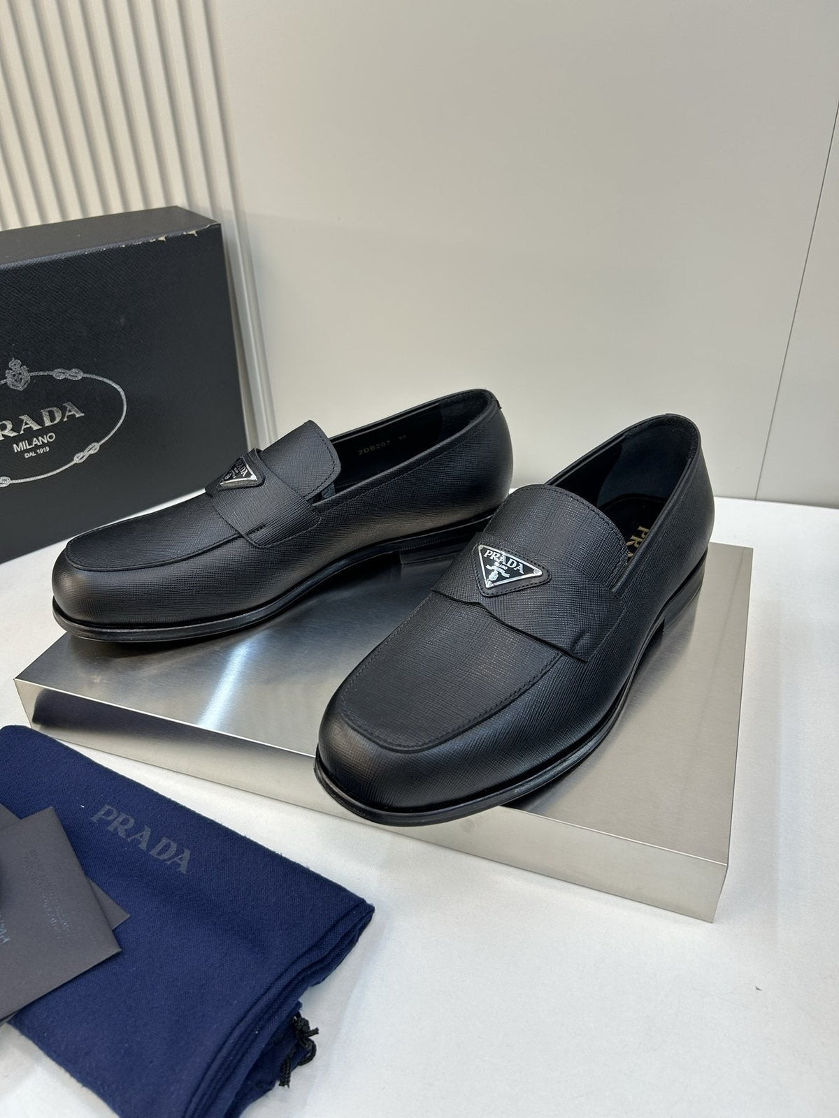 Prada Black Triangular Plaque Loafers