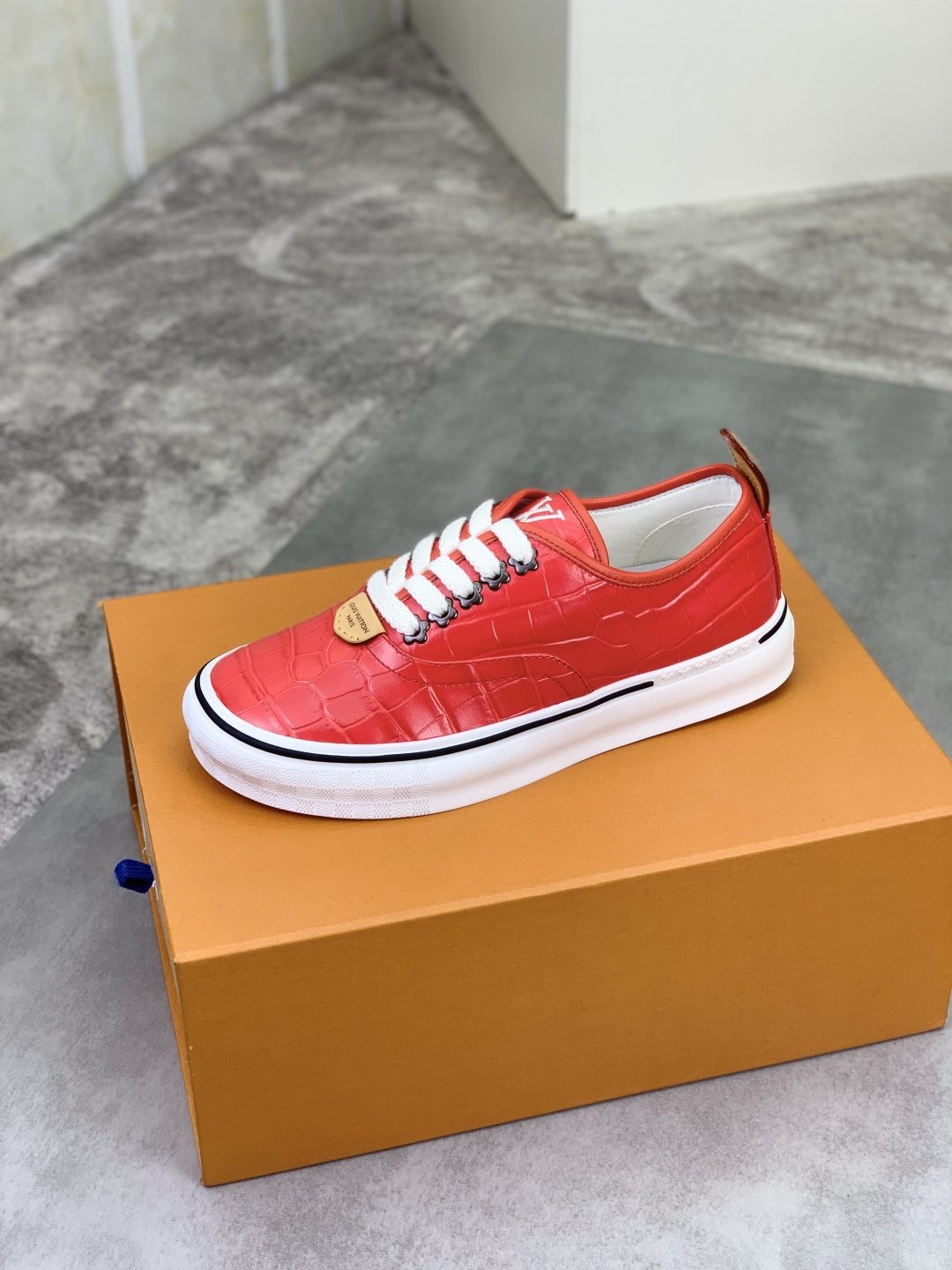 Louis Vuitton Red Embossed Low-Top Sneakers