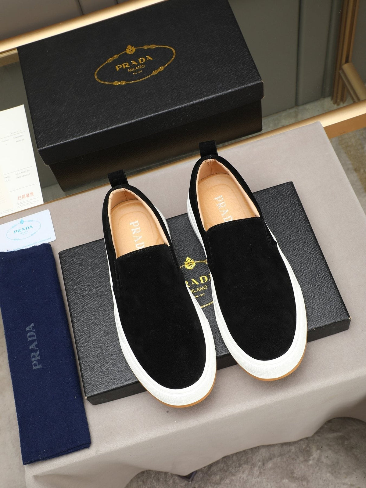 Prada Leather Slip-On Sneakers